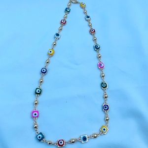 Evil eye protector trendy necklace.